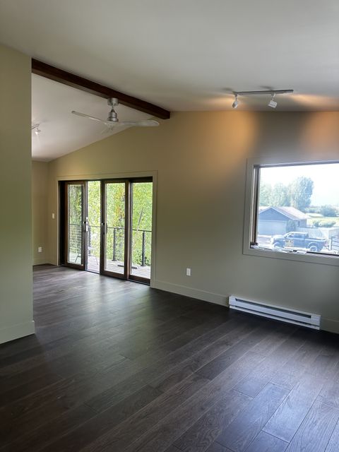 Bright room with sliding doors out to the deck